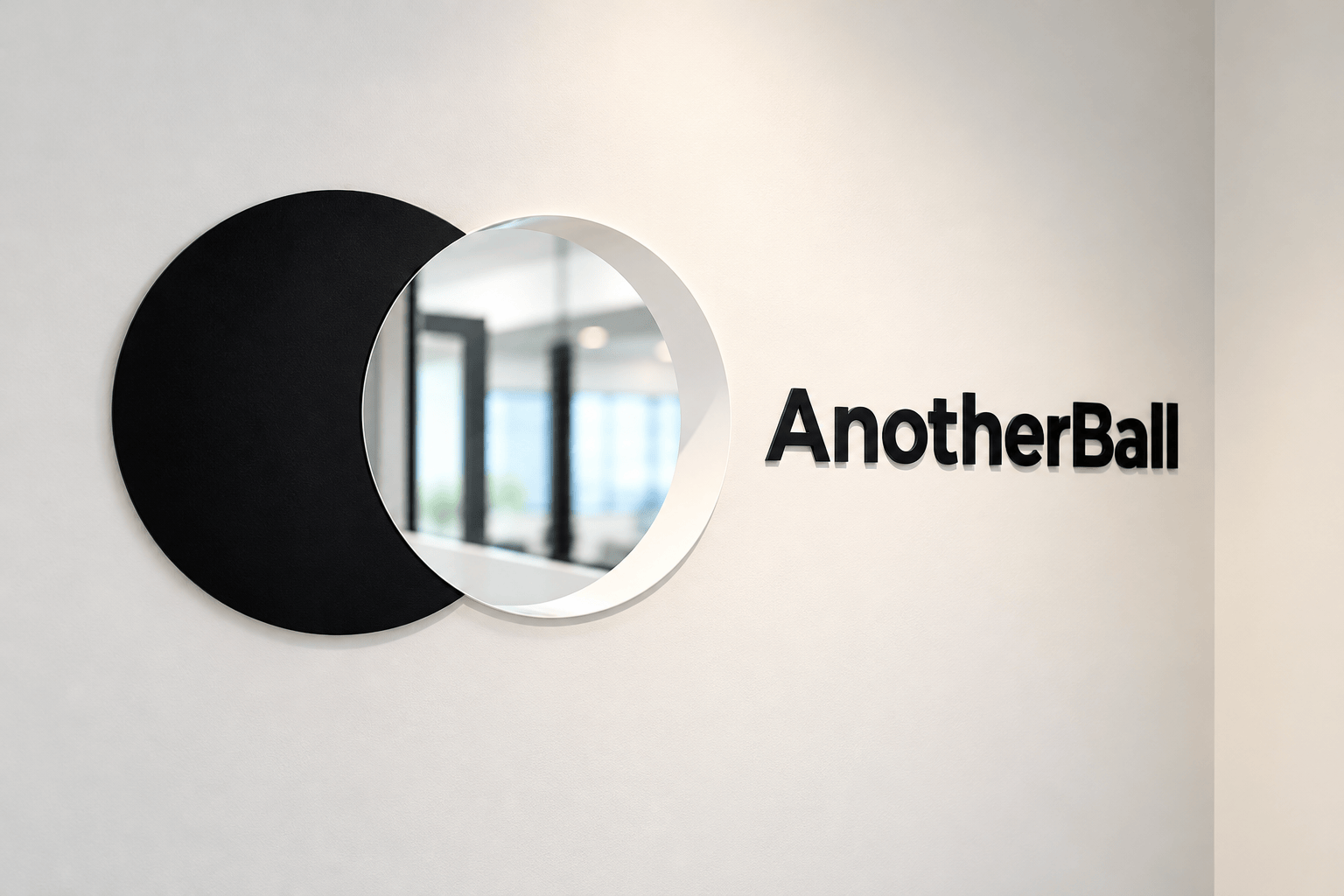 The AnotherBall logo at the entrance of the new office